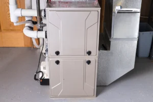 Furnace not igniting in bessemer city NC: high-efficiency residential furnace installed in a utility area beside HVAC